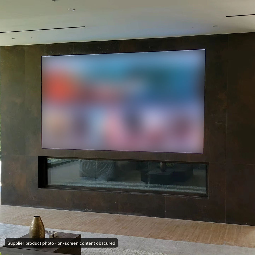 Supplier product photo of a MicroLED wall installed above a linear fireplace in a residential living space (on-screen content obscured)